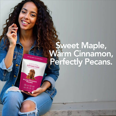 Smiling woman holding a Maple Cinnamon Pecans pouch