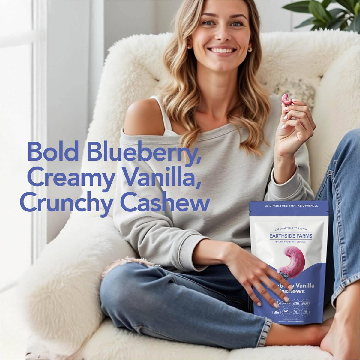 Woman relaxing on a sofa holding a Blueberry Vanilla Cashews pouch
